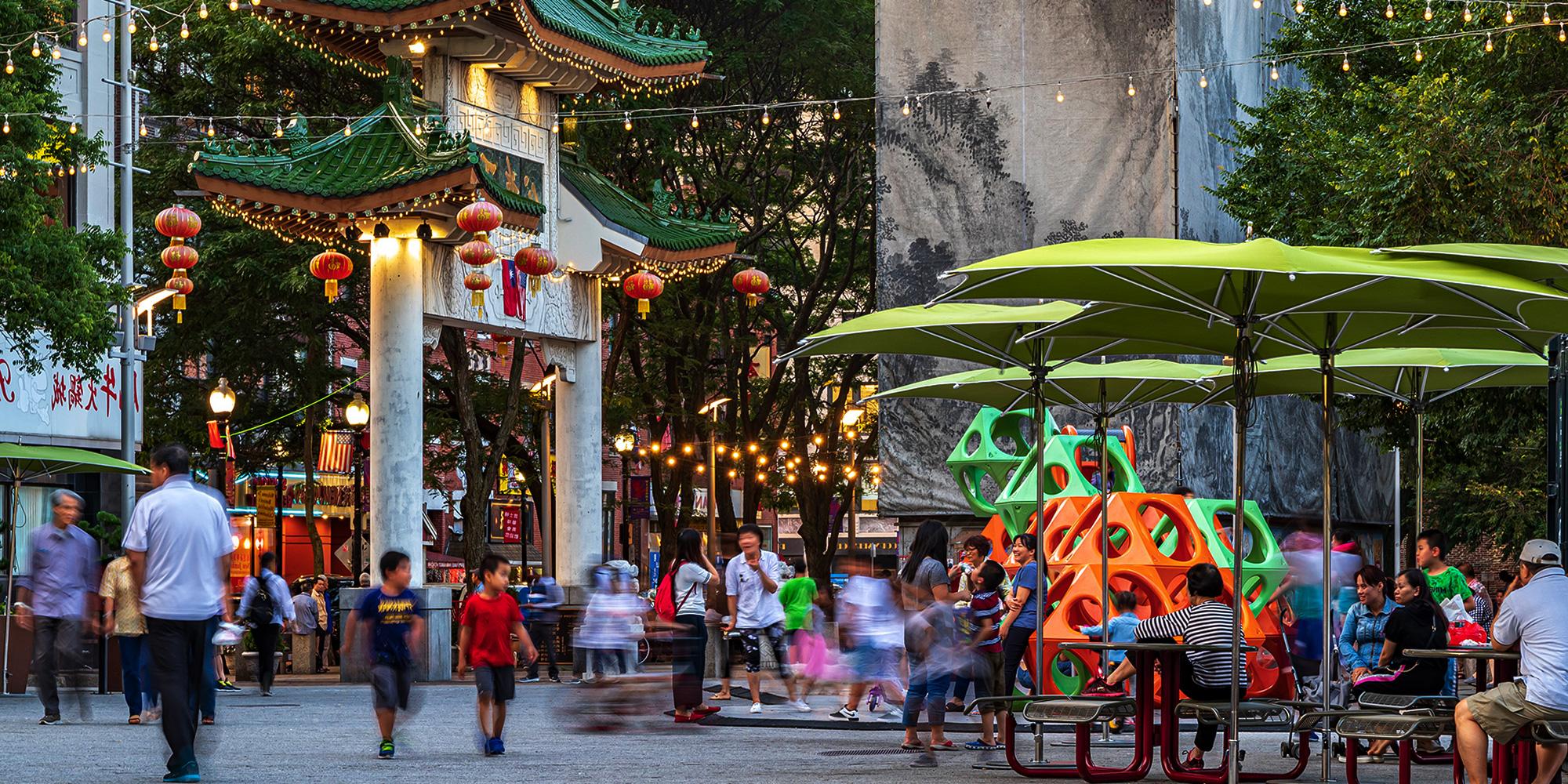 People walking through Chinatown park